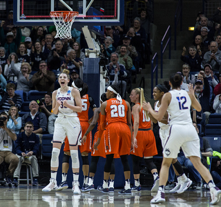 Katie Lou Samuelson celebrates. She had 23 points, including 11 free throws.